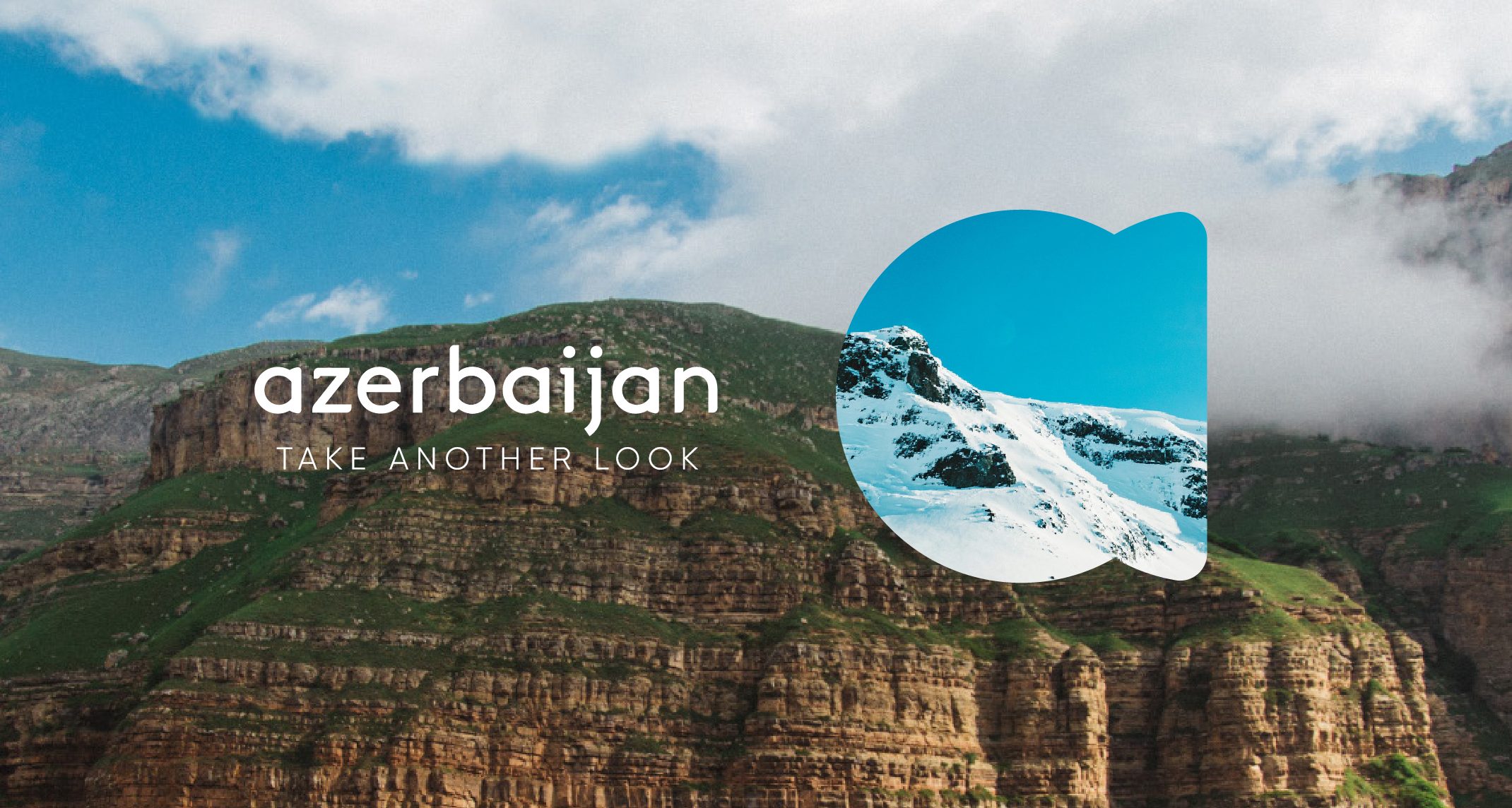 Azerbaijan, Take another look: the logo over red cliffs, with a snowy peak seen through the reveal lens