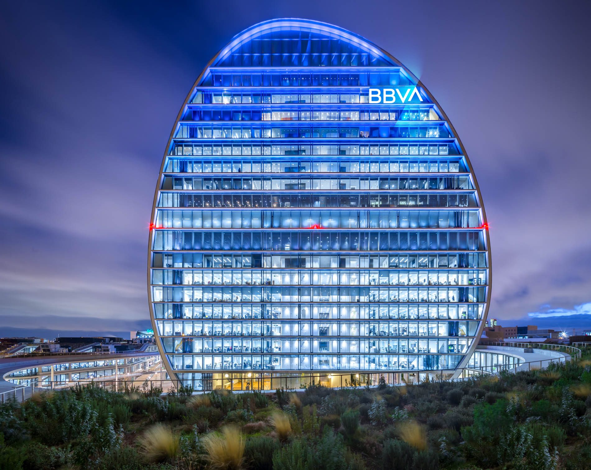 BBVA headquarters in Madrid lit blue at night