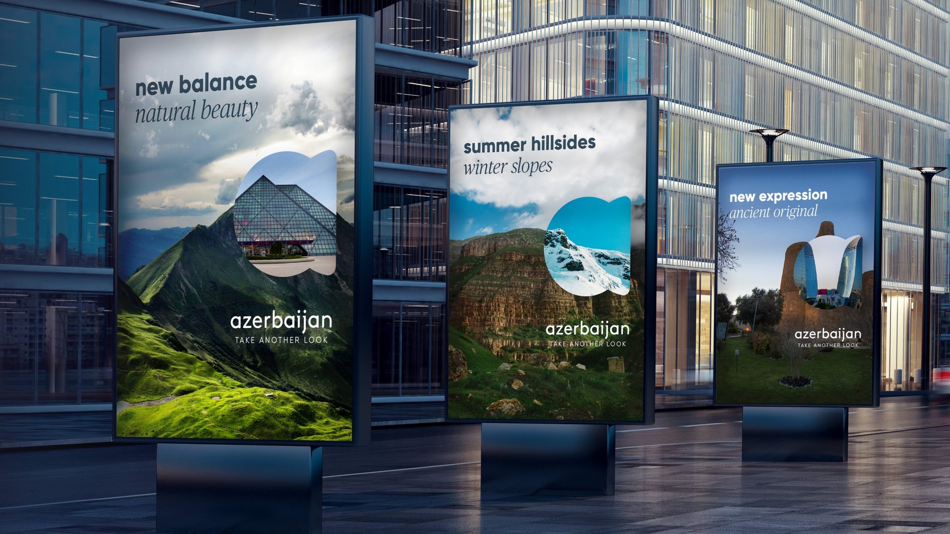 Three street posters: new balance, natural beauty; summer hillsides, winter slopes; new expression, ancient original